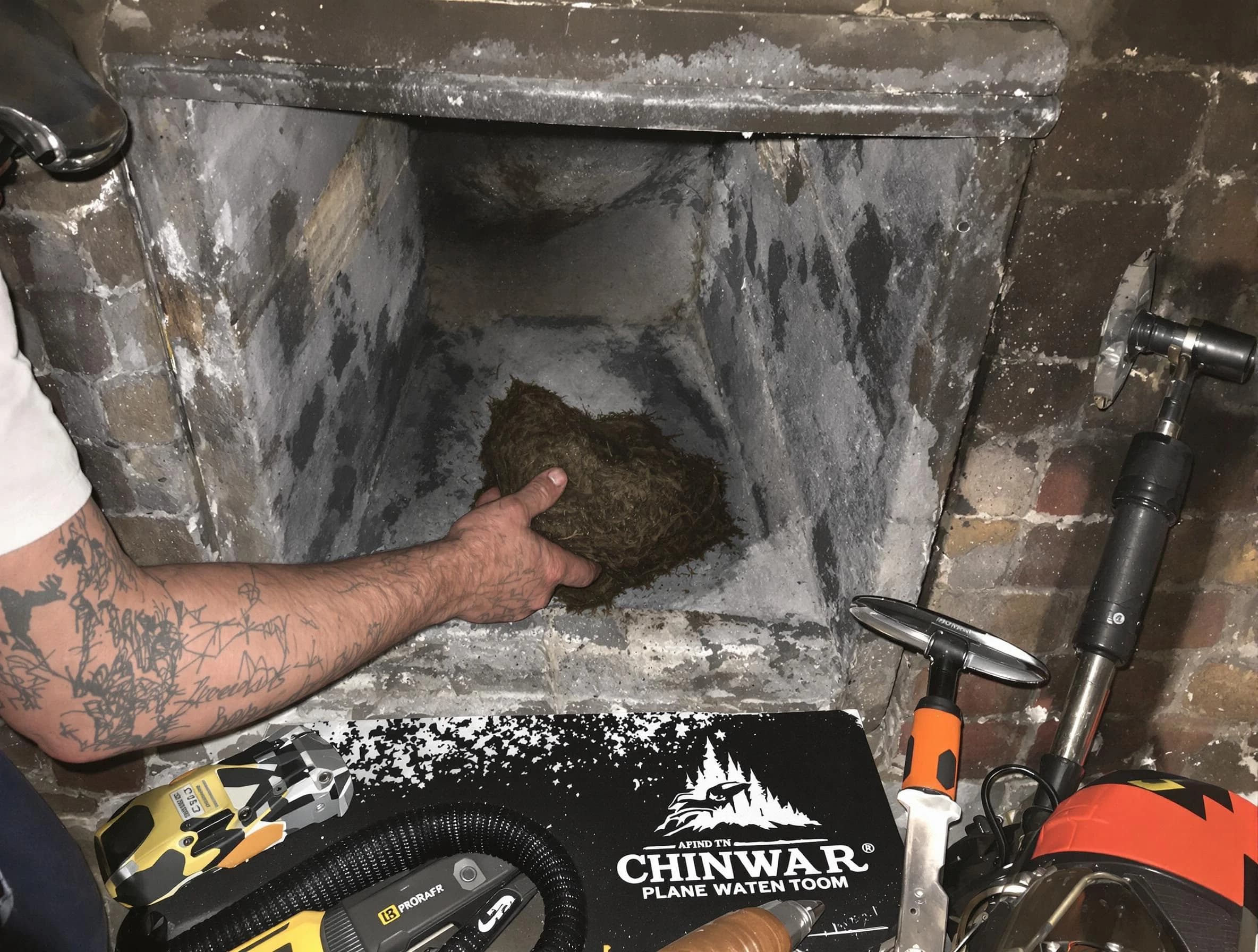 Highland Chimney Sweep safely removing debris and screening chimney in Highland, UT